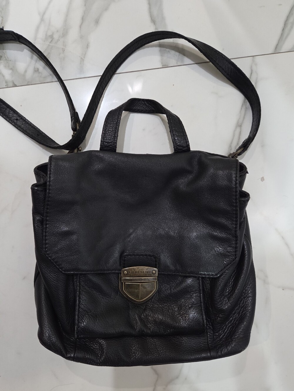 Liebeskind Berlin Otsu Black Leather Crossbody Backpack with Brass Shield Lock